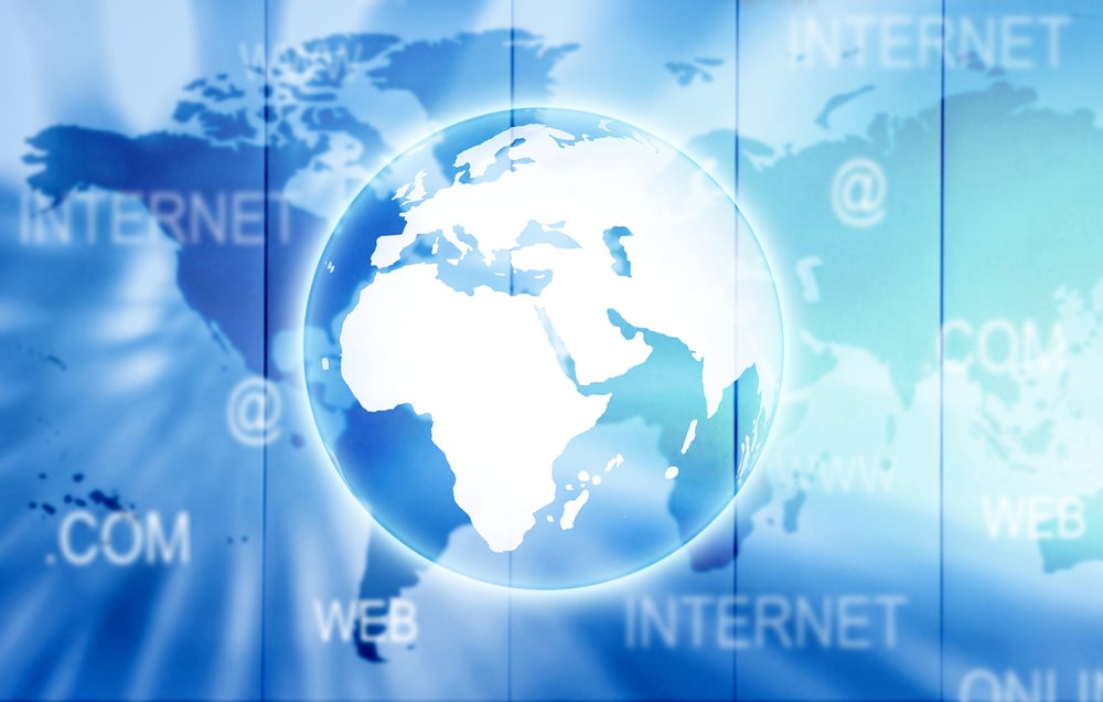 blue business and technology background with a globe in the middle